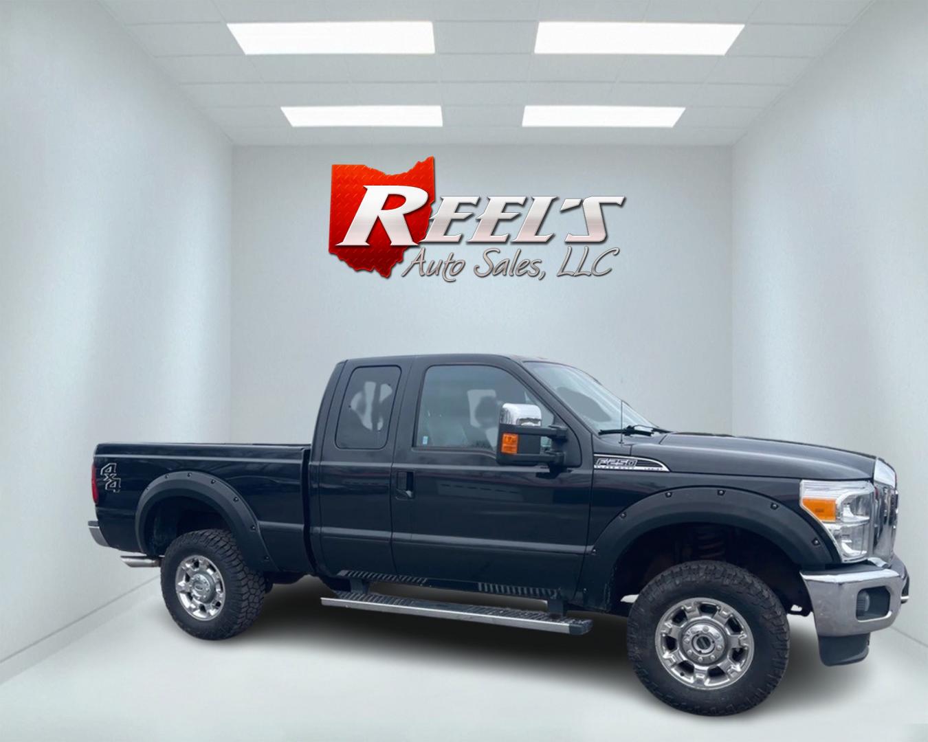 2015 Black /Black Ford F-250 SD Lariat SuperCab Long Bed 4WD (1FT7X2B63FE) with an 6.2L V8 OHV 16V FFV engine, 6-Speed Automatic transmission, located at 547 E. Main St., Orwell, OH, 44076, (440) 437-5893, 41.535435, -80.847855 - Photo#2